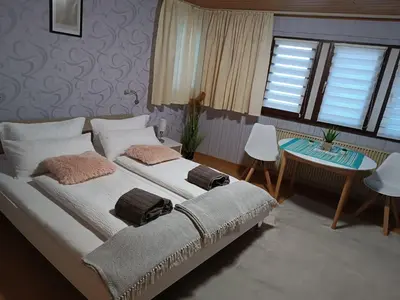 Ein Bett oder Betten in einem Zimmer der Unterkunft Haus Roxy