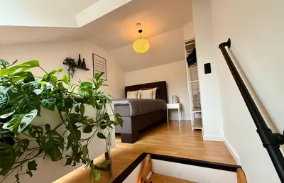 Ein Bett oder Betten in einem Zimmer der Unterkunft Maisonette Vino Veritas - Auszeit am Weinberg