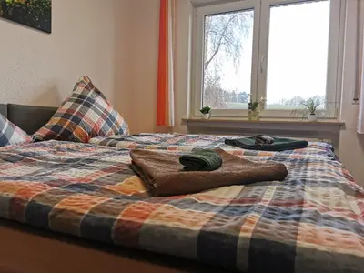 Ein Bett oder Betten in einem Zimmer der Unterkunft Speedy's Gästehaus