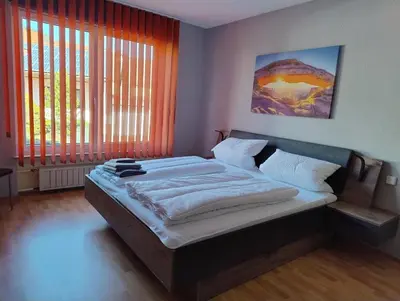 Ein Bett oder Betten in einem Zimmer der Unterkunft Klimatisiertes Wohnen in der Alten Apotheke Oberkirchen