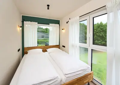 Ein Bett oder Betten in einem Zimmer der Unterkunft Luxuscontainer am Nürburgring #1