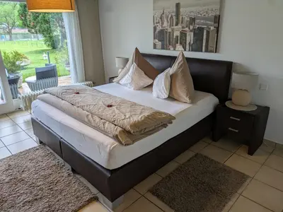 Ein Bett oder Betten in einem Zimmer der Unterkunft Ferienwohnungen Lohmann