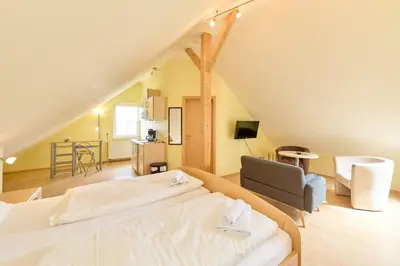 Ein Bett oder Betten in einem Zimmer der Unterkunft Gästehaus Binz-Meyer Fewo Grainskopf