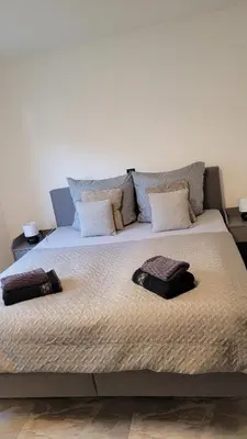 Ein Bett oder Betten in einem Zimmer der Unterkunft Ruhig gelegende Ferienwohnung an der Mosel