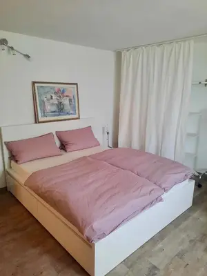Ein Bett oder Betten in einem Zimmer der Unterkunft Ferienwohnung Körnernest