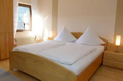 Ein Bett oder Betten in einem Zimmer der Unterkunft Ferienwohnung Panoramablick