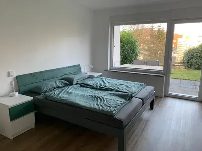 Ein Bett oder Betten in einem Zimmer der Unterkunft Ferienwohnung Schwung