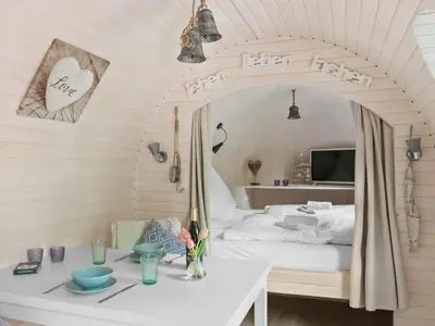 Ein Bett oder Betten in einem Zimmer der Unterkunft Iglucraft Tiny Haus im Naheland I Grill I Wasserspielpatz I W-LAN