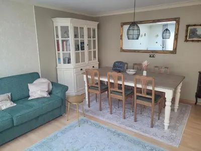 Ein Sitzbereich in der Unterkunft Ferienwohnung Mayener Jung mit schönem Innenhof