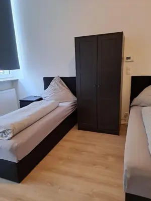 Ein Bett oder Betten in einem Zimmer der Unterkunft Monteurzimmer RLP - Ihr Zuhause auf Zeit!