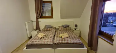 Ein Bett oder Betten in einem Zimmer der Unterkunft Hotel und Restaurant Adriatic