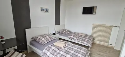 Ein Bett oder Betten in einem Zimmer der Unterkunft Hotel und Restaurant Adriatic