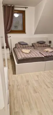 Ein Bett oder Betten in einem Zimmer der Unterkunft Hotel und Restaurant Adriatic