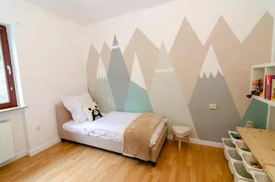 Ein Bett oder Betten in einem Zimmer der Unterkunft Moselblick-Balkon Familienparadies mit Spielzimmer ruhig & großzügig