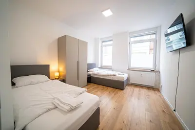 Ein Bett oder Betten in einem Zimmer der Unterkunft Monteurwohnung Andreas