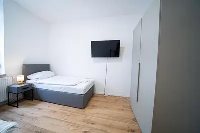 Ein Bett oder Betten in einem Zimmer der Unterkunft Monteurwohnung Andreas