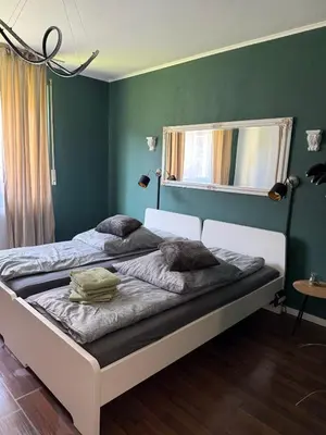 Ein Bett oder Betten in einem Zimmer der Unterkunft Schöne Wohnung in ruhiger Lage II