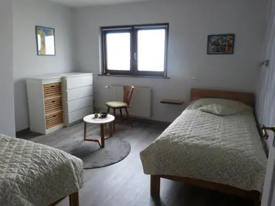Ein Bett oder Betten in einem Zimmer der Unterkunft Barbara und Walter