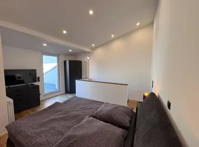 Ein Bett oder Betten in einem Zimmer der Unterkunft Ferienwohnung Kürenzer Auszeit