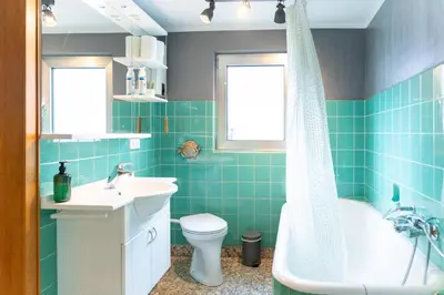 Ein Badezimmer in der Unterkunft Haus Nürburgring I 4 Schlafzimmer für 1-10 Personen I Küche I Garten I Grillplatz