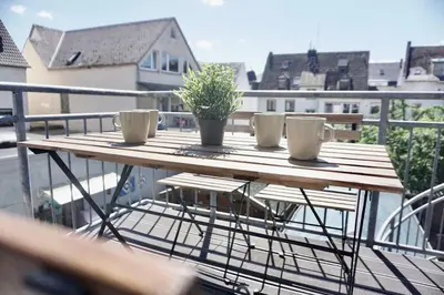 Ein Balkon oder eine Terrasse in der Unterkunft NEU zentrale Wohnung Netflix Balkon 4 Gäste