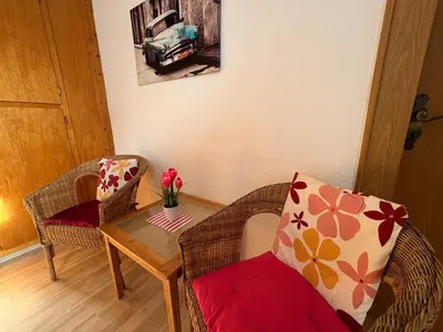 Ein Sitzbereich in der Unterkunft Haus Glücksmomente Bostalsee