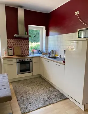 Küche/Küchenzeile in der Unterkunft Haus Glücksmomente Bostalsee