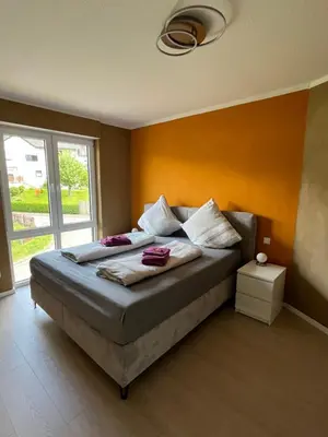 Ein Bett oder Betten in einem Zimmer der Unterkunft Haus Mara