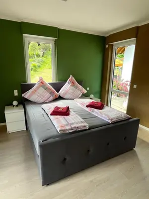 Ein Bett oder Betten in einem Zimmer der Unterkunft Haus Mara