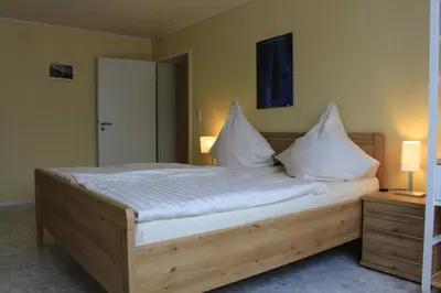 Ein Bett oder Betten in einem Zimmer der Unterkunft Weingut Gorges-Reinhard