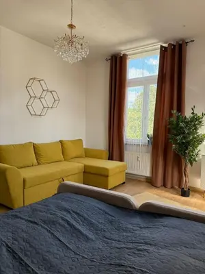 Ein Sitzbereich in der Unterkunft Schickes Apartment am Rhein mit Rheinblick 4
