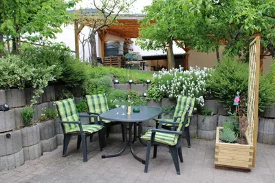 Ein Garten an der Unterkunft Ferienwohnung Am Rosenberg