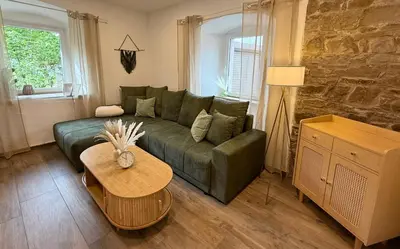 Ein Sitzbereich in der Unterkunft Eifel Apartment