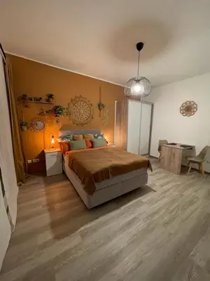 Ein Bett oder Betten in einem Zimmer der Unterkunft Desert Rose 34 in Mayen