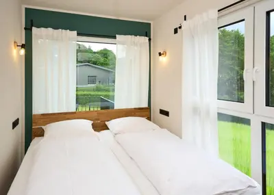 Ein Bett oder Betten in einem Zimmer der Unterkunft Luxuscontainer am Nürburgring #4