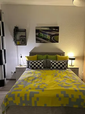 Ein Bett oder Betten in einem Zimmer der Unterkunft 36 Nürburgring in Mayen