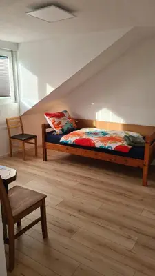 Ein Bett oder Betten in einem Zimmer der Unterkunft Apartment Hermeskeil 3