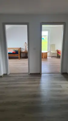 Ein Bett oder Betten in einem Zimmer der Unterkunft Apartment Hermeskeil 3