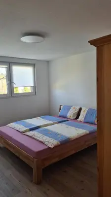 Ein Bett oder Betten in einem Zimmer der Unterkunft Apartment Hermeskeil 3