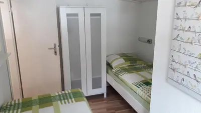 Ein Bett oder Betten in einem Zimmer der Unterkunft Ferienhaus 8