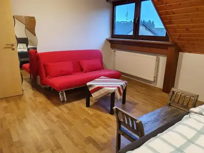 Ein Sitzbereich in der Unterkunft Ferienwohnung Meuspath