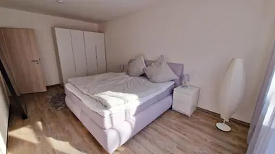Ein Bett oder Betten in einem Zimmer der Unterkunft Zum Fuchskopp
