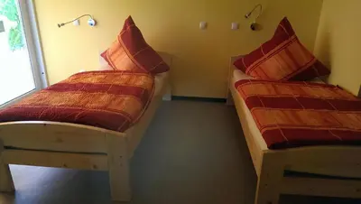 Ein Bett oder Betten in einem Zimmer der Unterkunft Humboldtruh