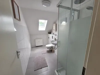 Ein Badezimmer in der Unterkunft Gemütliches Dachapartment