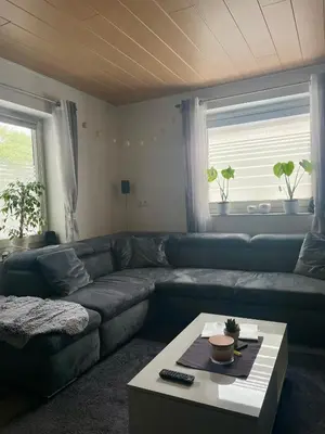 Ein Sitzbereich in der Unterkunft Ferienhaus An der Quell