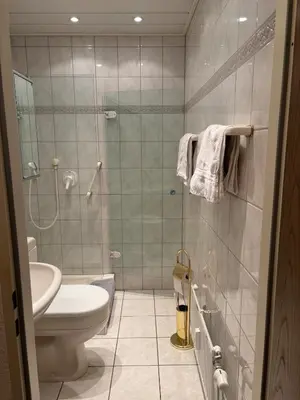 Ein Badezimmer in der Unterkunft Ferienwohnung -Schöne Aussicht- im Taunusblick A-1003