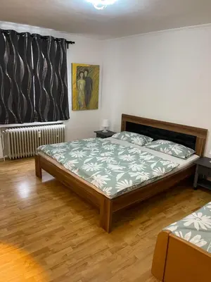 Ein Bett oder Betten in einem Zimmer der Unterkunft FeWo Centrum Daun