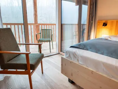 Ein Bett oder Betten in einem Zimmer der Unterkunft Schwollbachhof - Naturerlebnis im Hunsrück