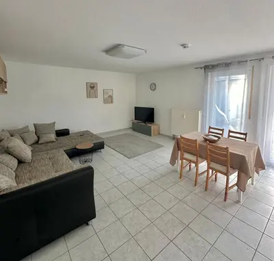 Ein Sitzbereich in der Unterkunft Ferienwohnung Kornotti