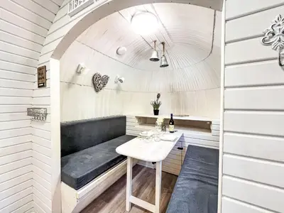 Ein Sitzbereich in der Unterkunft Holiday Home Tiny Haus Vierseenblick Nummer 1 by Interhome